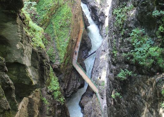 The Breitachklamm gorge from the air with the footbridge leading through it and people walking on it