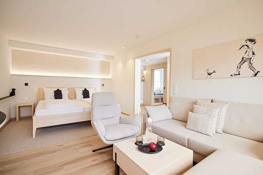Living and sleeping area in the Widderstein double room